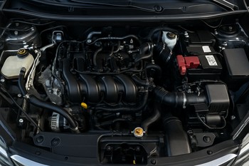 Clean engine bay with visible intake manifold and wiring harness